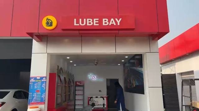 The Lube Bay storefront sign